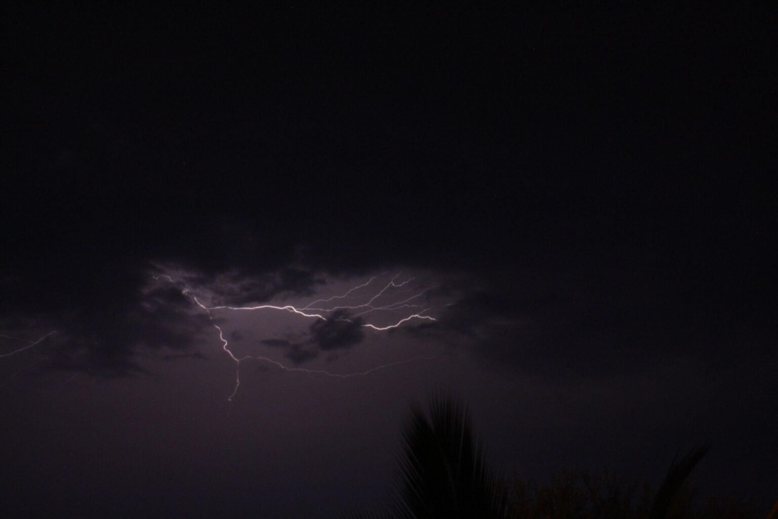 Awe-inspiring scene of a thunderstorm in Bengaluru, India with a dramatic lightning strike